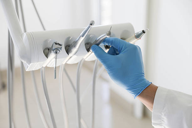 Professional Invisalign Clear Aligners technician working in Tilton Northfield, NH
